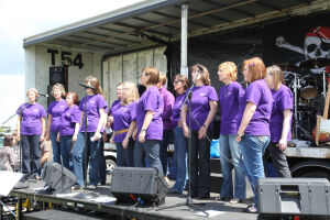 Local acapella group &#039;Rockapellas&#039; on the stage at Broughton Astley Party in the Park